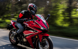 Business professional signing a legal document with pen, symbolizing contracts, agreements, and legal or financial paperwork