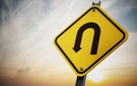 U turn road sign